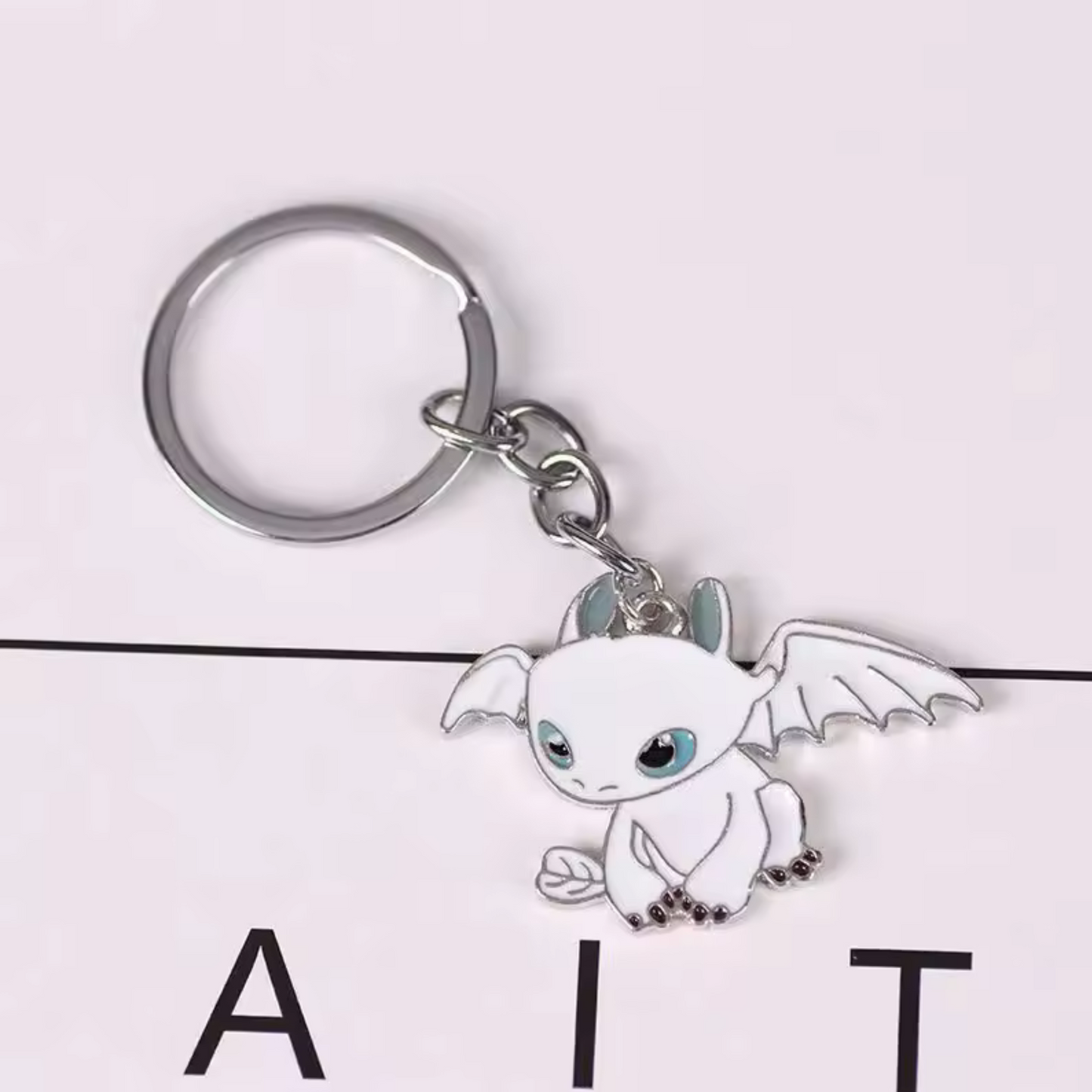 Porte-clé Dragons (2 modèles différents) – Krokmou et Light Fury en argent