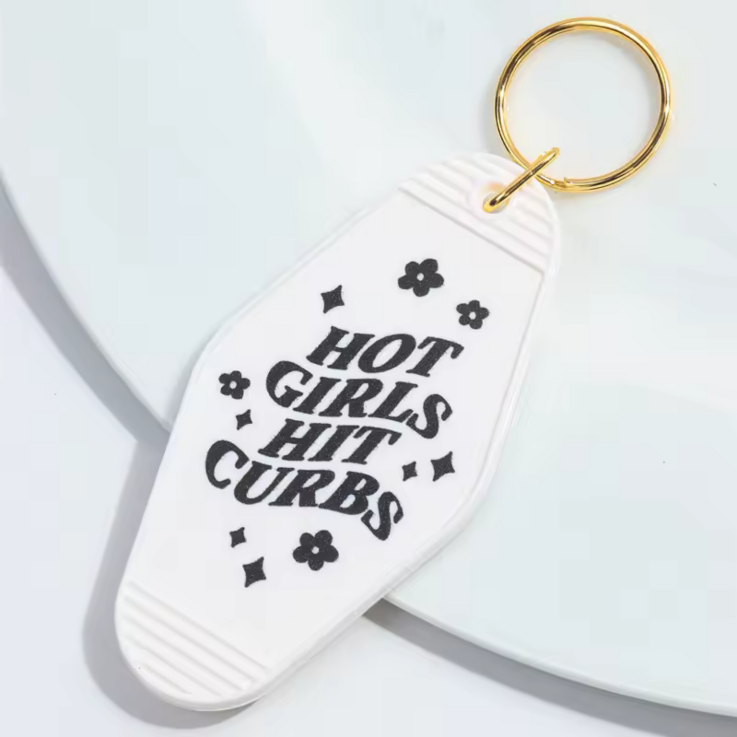 Porte-clé "Hot Girls Hit Curbs" – 3 coloris : noir, blanc ou rose