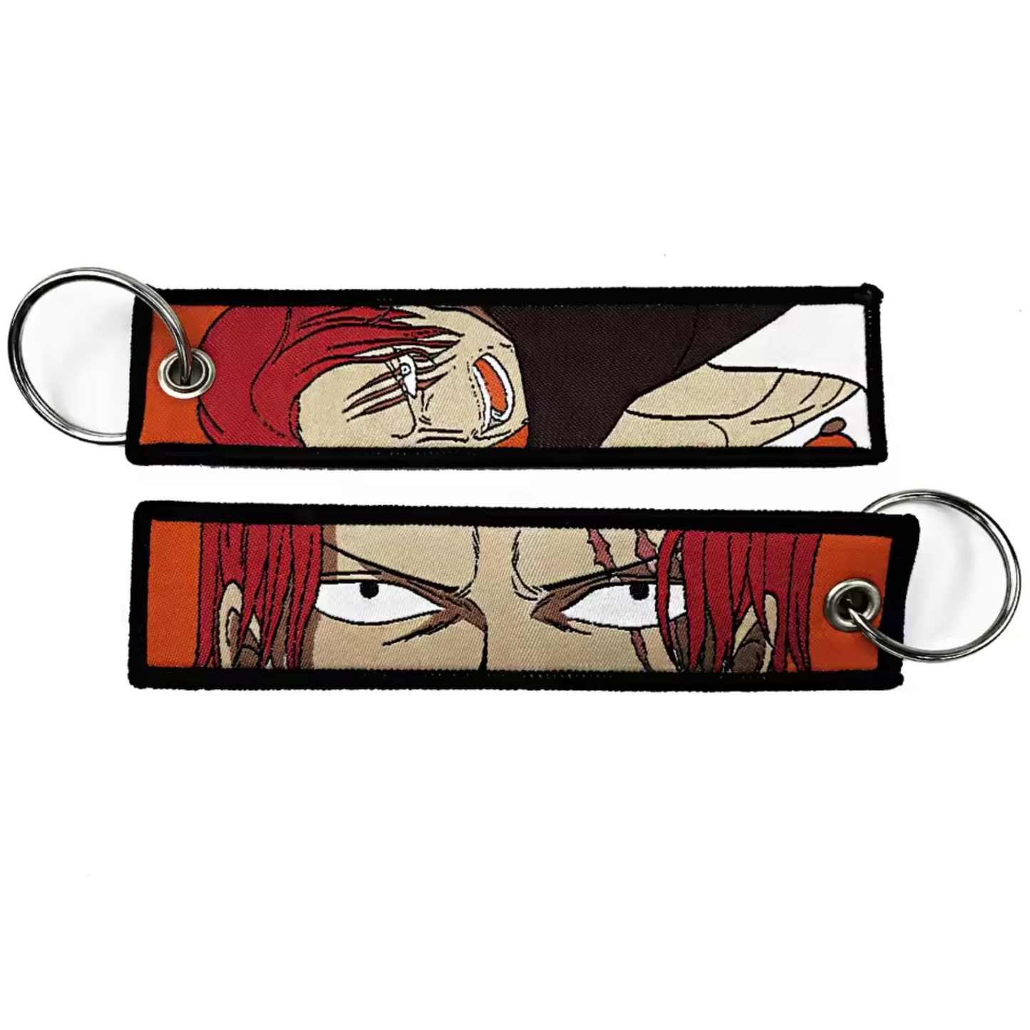 Fais ressortir toute l’intensité de l’Empereur au regard de feu avec ce long porte-clé textile à l’effigie de Shanks en pleine colère ! Des deux côtés, retrouve le légendaire roux dans une posture puissante, regard foudroyant et mâchoire serrée, prêt à tout pour protéger ses valeurs. Ce porte-clé robuste et impressionnant est parfait pour personnaliser tes clés, ton sac ou ton rétroviseur, et te rappellera que quand Shanks se met en colère… le monde retient son souffle. ☠️🟥