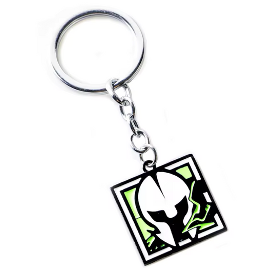 Prends le contrôle du terrain avec ce porte-clé Rainbow Six Siege à l’effigie de Maestro, le maître des tourelles ! Représentant son icône emblématique, ce porte-clé robuste et stylé est parfait pour les fans de défense technologique et de contrôle tactique. Accroche-le à tes clés, ton sac ou ton setup gaming pour afficher ta puissance stratégique. L’accessoire idéal pour les joueurs qui aiment dominer la partie sur R6S !
