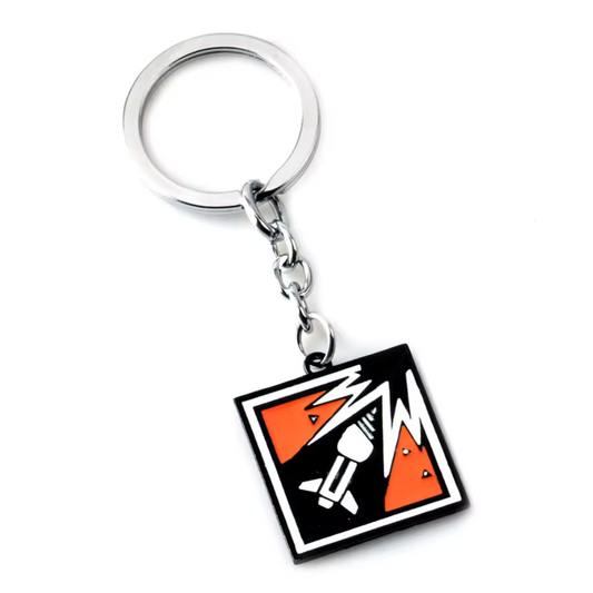 Fonce dans l’action avec ce porte-clé Rainbow Six Siege à l’effigie d’Ash, l’une des opératrices les plus emblématiques du jeu ! Avec son icône reconnaissable entre mille, ce porte-clé solide et stylé est parfait pour les fans de rapidité, d’attaque frontale et d’efficacité. Accroche-le à tes clés, ton sac ou ton setup gaming pour afficher ta passion pour les assauts éclairs. L’accessoire incontournable pour tous les main Ash de R6S !