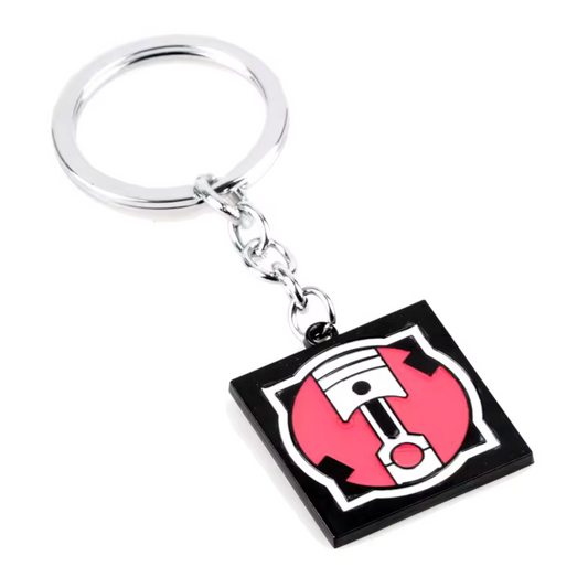 Verrouille la zone avec ce porte-clé Rainbow Six Siege à l’effigie de Gridlock, l’opératrice australienne spécialiste du contrôle de terrain ! Arborant son icône emblématique, ce porte-clé robuste et stylé est parfait pour les fans de stratégie offensive et de gadgets piégeurs. Accroche-le à tes clés, ton sac ou ton setup gaming pour montrer ton goût pour les attaques bien planifiées. Un accessoire indispensable pour les joueurs tactiques de R6S !