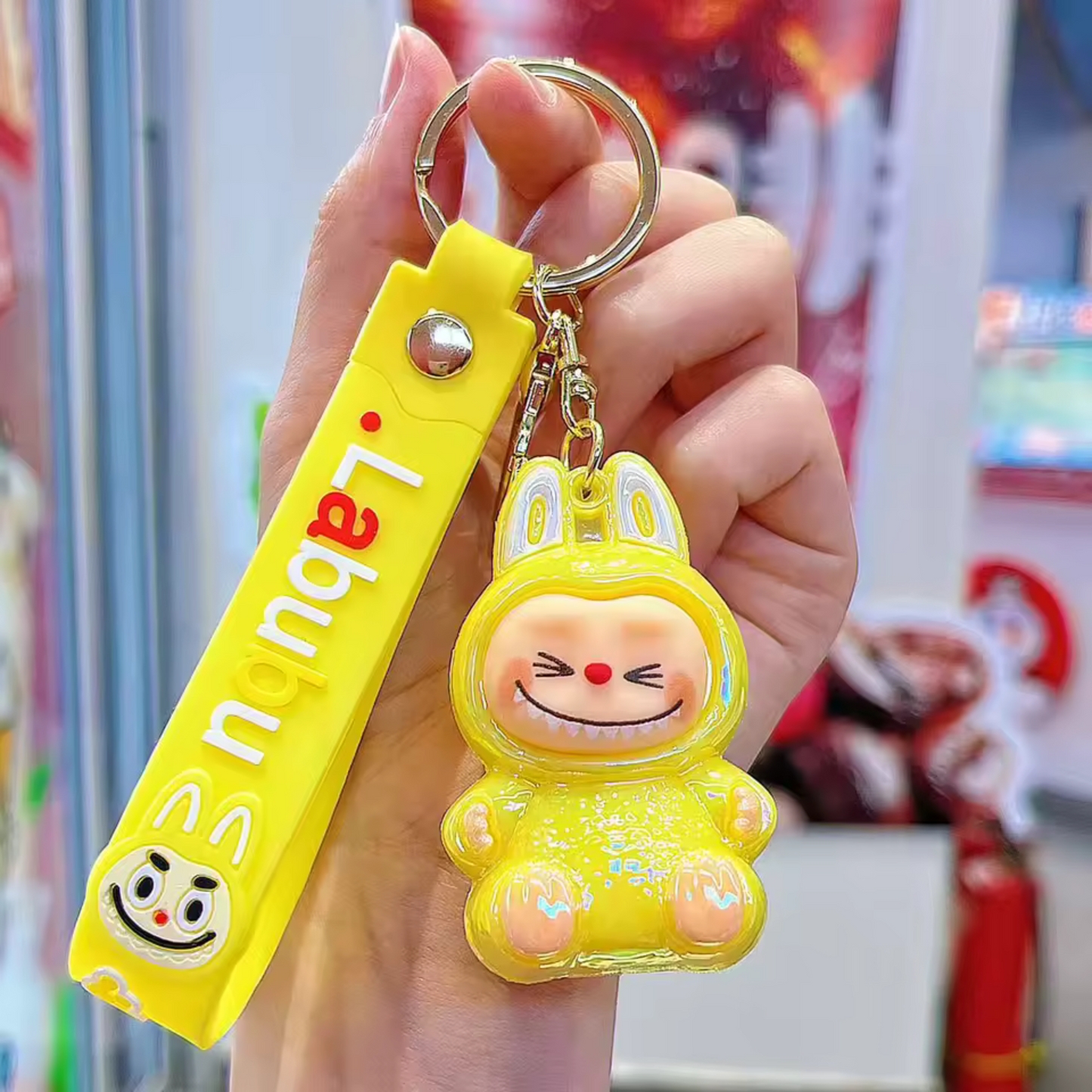 Porte-Clé Labubu Assis Brillant – Petit Format, Grand Éclat | 2 Coloris Disponibles