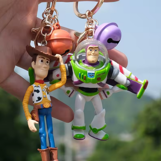 Porte-clé Toy Story – 4 modèles : Buzz l’Éclair & Woody avec clochette