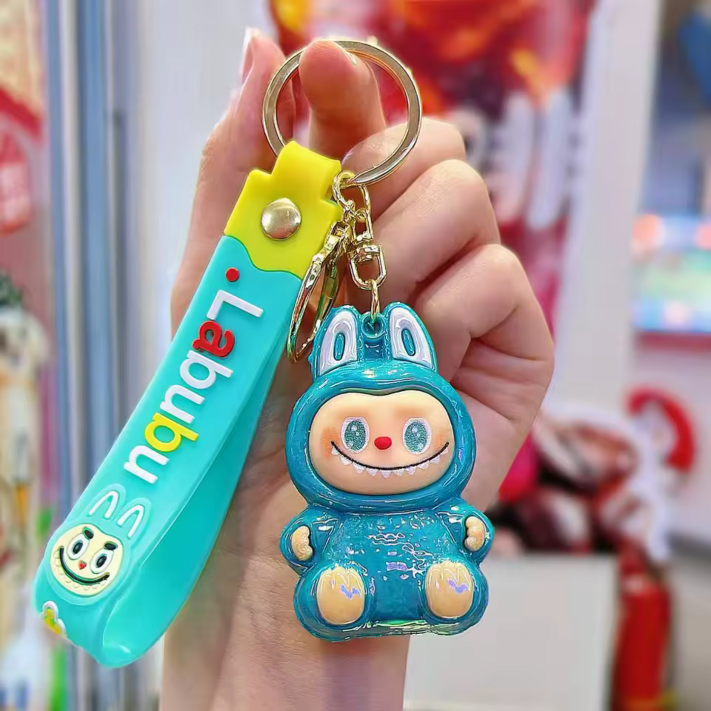 Porte-Clé Labubu Assis Brillant – Petit Format, Grand Éclat | 2 Coloris Disponibles
